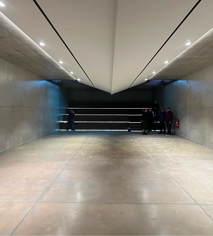 low-angle-view-impact-exhibition-center-against-clear-sky 2